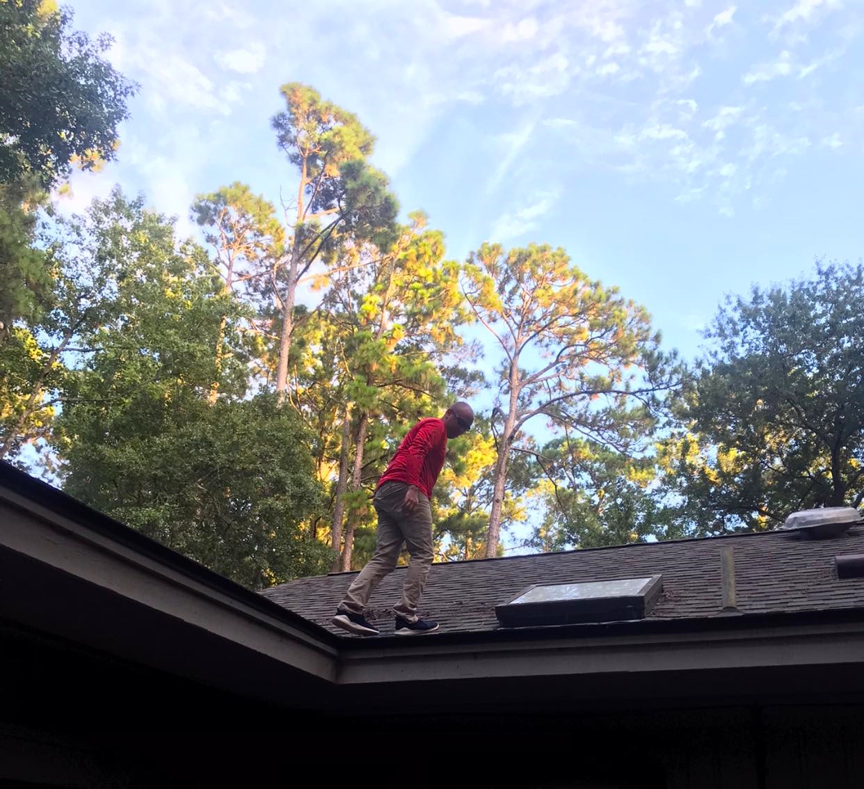 roof inspection man walking on roof